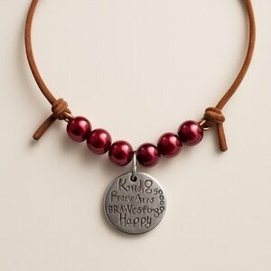 Elegant Red Beaded Necklace with Inspirational Pendant